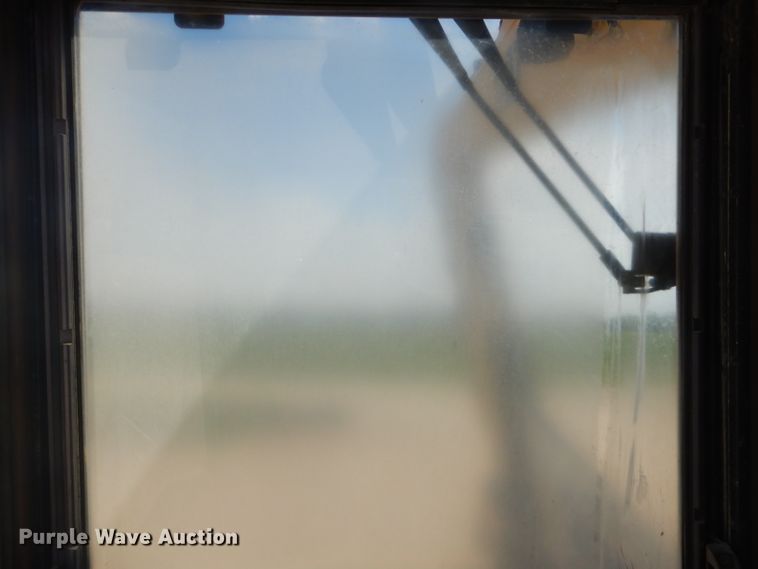 image for item GP9029 1986 Caterpillar 212 rubber tired excavator