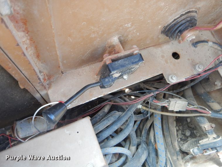 image for item GP9029 1986 Caterpillar 212 rubber tired excavator