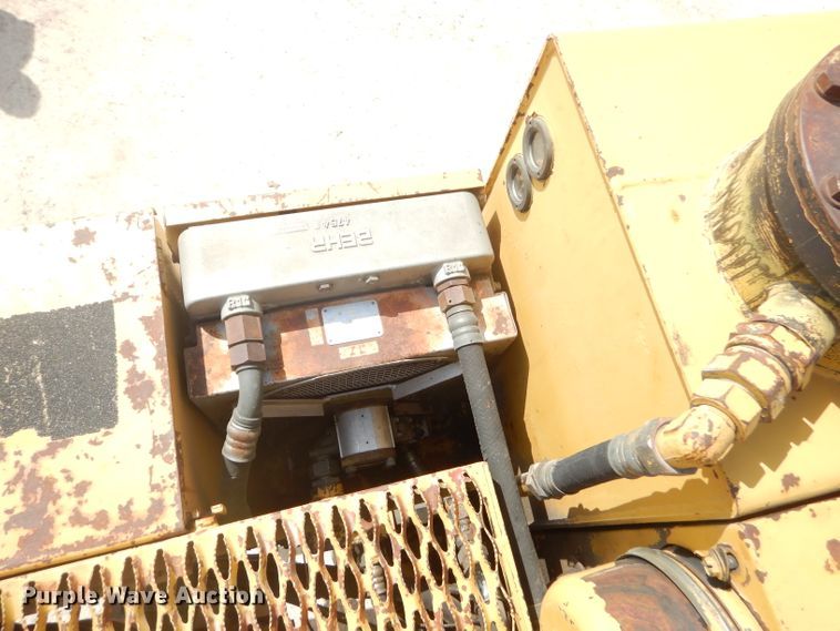 image for item GP9029 1986 Caterpillar 212 rubber tired excavator