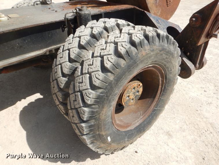 image for item GP9029 1986 Caterpillar 212 rubber tired excavator