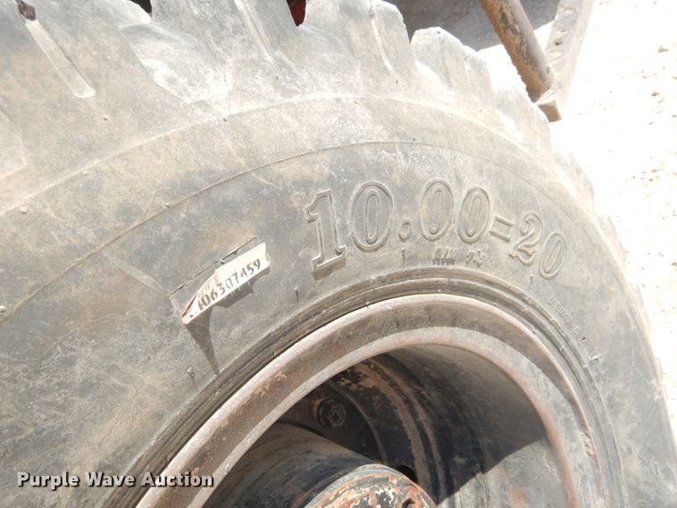 image for item GP9029 1986 Caterpillar 212 rubber tired excavator