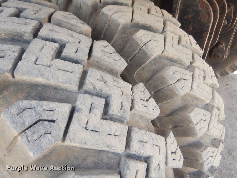 image for item GP9029 1986 Caterpillar 212 rubber tired excavator