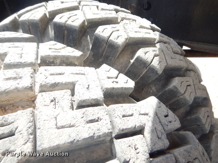 image for item GP9029 1986 Caterpillar 212 rubber tired excavator