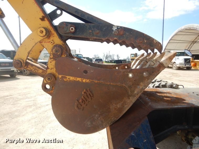 image for item GP9029 1986 Caterpillar 212 rubber tired excavator