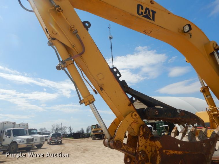 image for item GP9029 1986 Caterpillar 212 rubber tired excavator