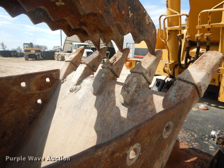 image for item GP9029 1986 Caterpillar 212 rubber tired excavator