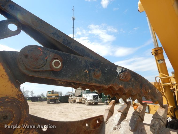 image for item GP9029 1986 Caterpillar 212 rubber tired excavator