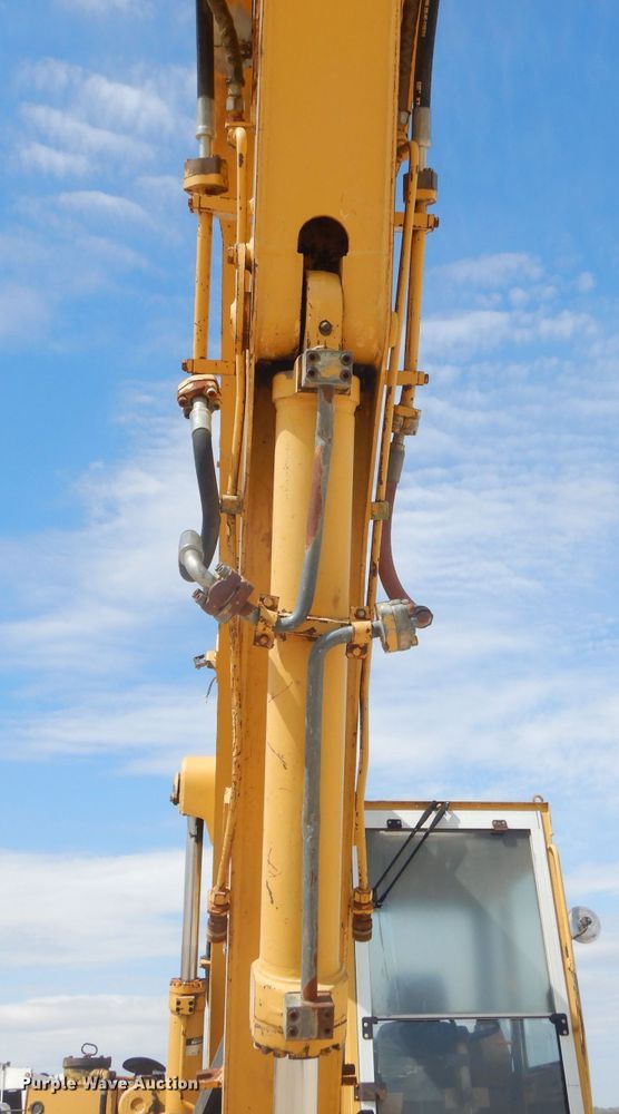 image for item GP9029 1986 Caterpillar 212 rubber tired excavator