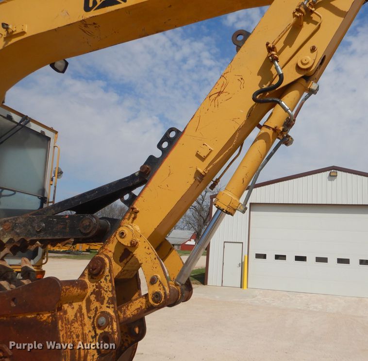 image for item GP9029 1986 Caterpillar 212 rubber tired excavator