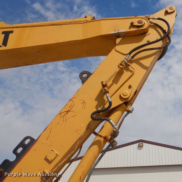 image for item GP9029 1986 Caterpillar 212 rubber tired excavator