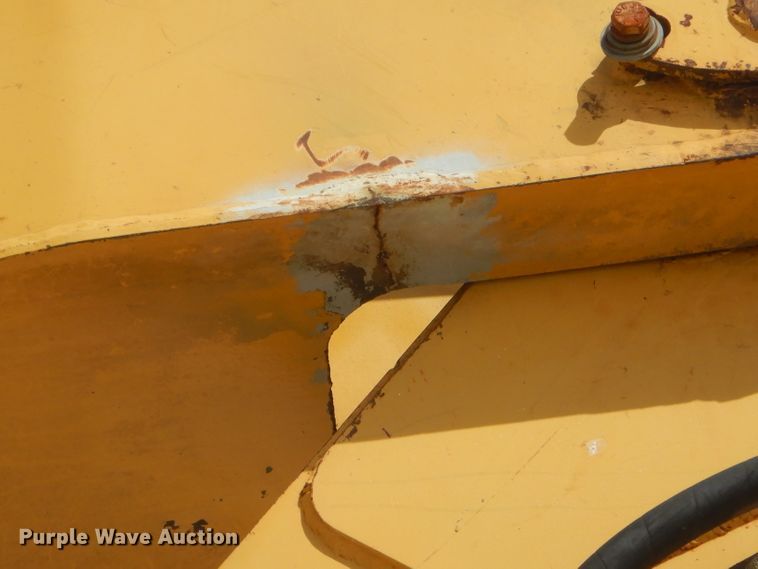 image for item GP9029 1986 Caterpillar 212 rubber tired excavator