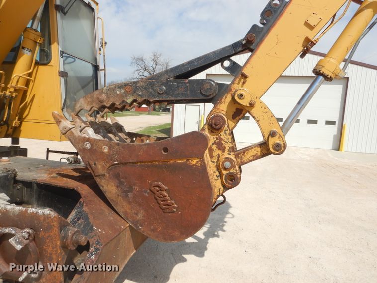 image for item GP9029 1986 Caterpillar 212 rubber tired excavator