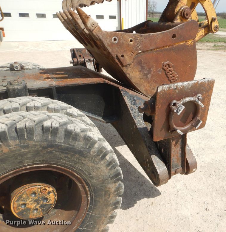 image for item GP9029 1986 Caterpillar 212 rubber tired excavator