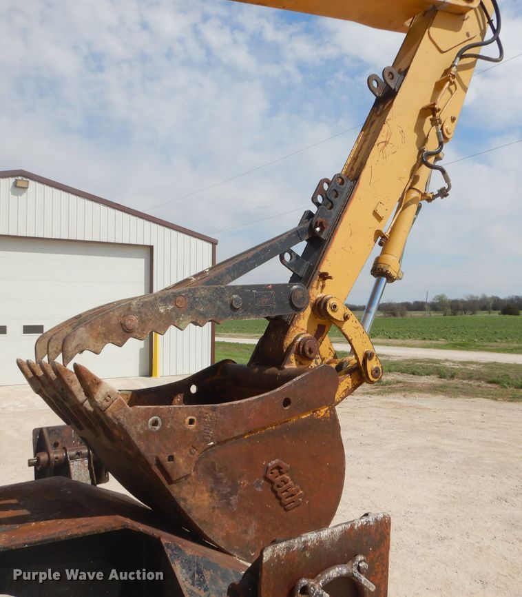 image for item GP9029 1986 Caterpillar 212 rubber tired excavator