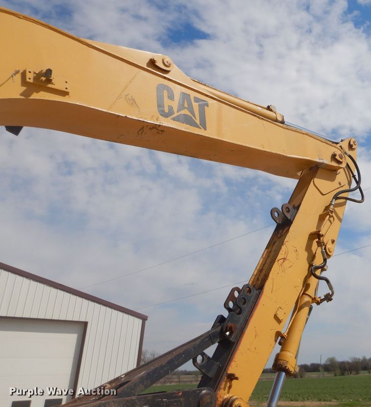 image for item GP9029 1986 Caterpillar 212 rubber tired excavator