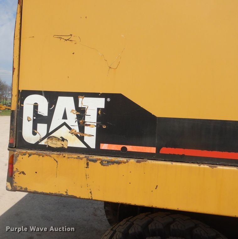 image for item GP9029 1986 Caterpillar 212 rubber tired excavator