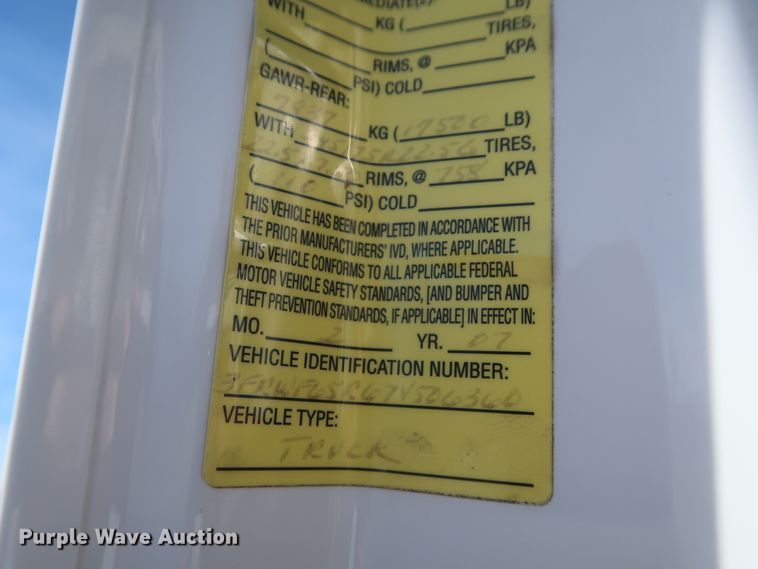 image for item GS9838 2007 Ford F650 Super Duty XLT utility bed truck with crane