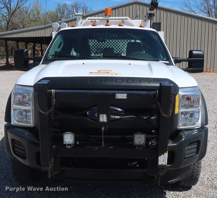 image for item GS9846 2013 Ford F550 Super Duty XL Crew Cab utility bed truck with crane