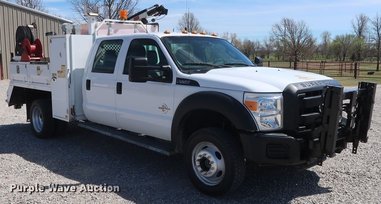 image for item GS9846 2013 Ford F550 Super Duty XL Crew Cab utility bed truck with crane