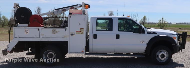 image for item GS9846 2013 Ford F550 Super Duty XL Crew Cab utility bed truck with crane