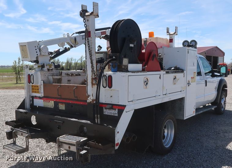 image for item GS9846 2013 Ford F550 Super Duty XL Crew Cab utility bed truck with crane