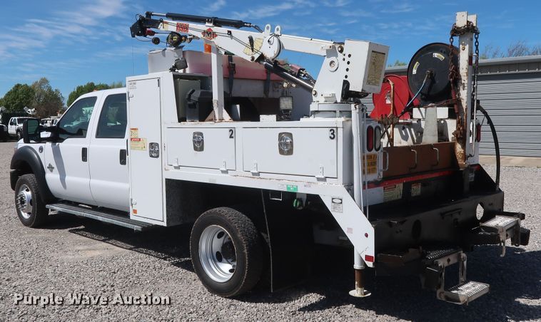 image for item GS9846 2013 Ford F550 Super Duty XL Crew Cab utility bed truck with crane