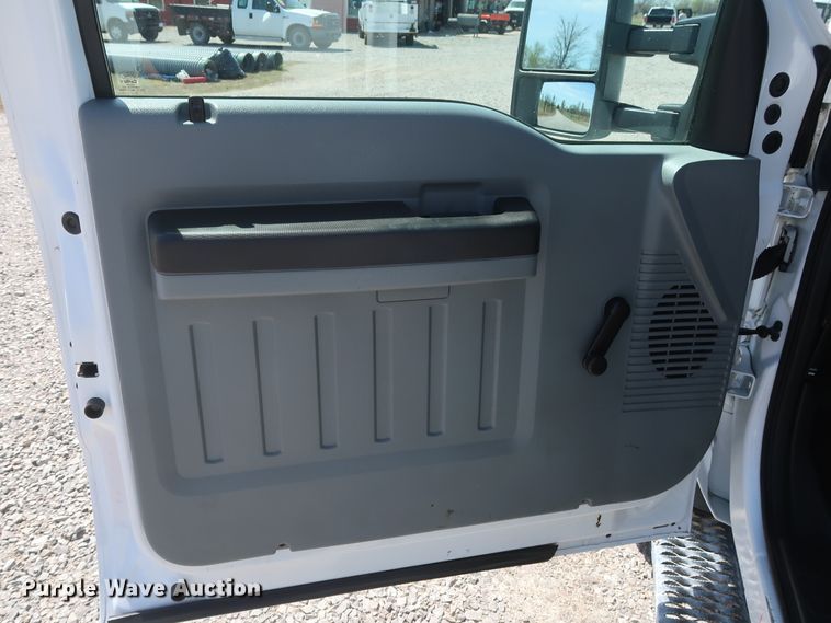 image for item GS9846 2013 Ford F550 Super Duty XL Crew Cab utility bed truck with crane