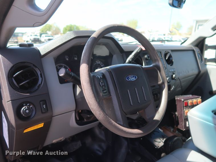 image for item GS9846 2013 Ford F550 Super Duty XL Crew Cab utility bed truck with crane