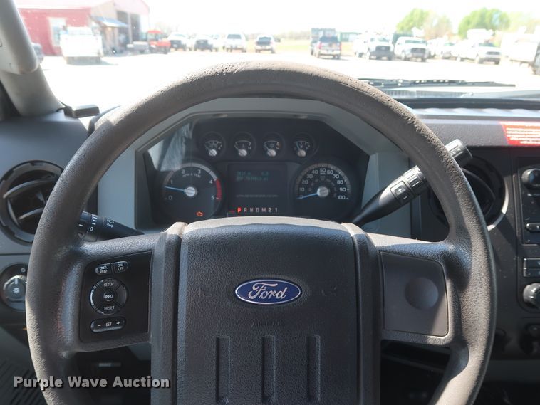 image for item GS9846 2013 Ford F550 Super Duty XL Crew Cab utility bed truck with crane