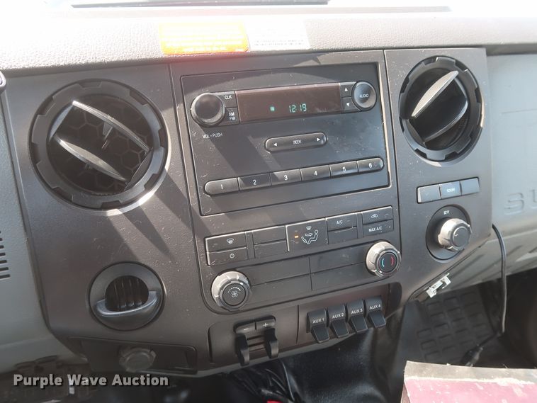 image for item GS9846 2013 Ford F550 Super Duty XL Crew Cab utility bed truck with crane