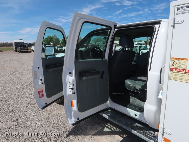 image for item GS9846 2013 Ford F550 Super Duty XL Crew Cab utility bed truck with crane