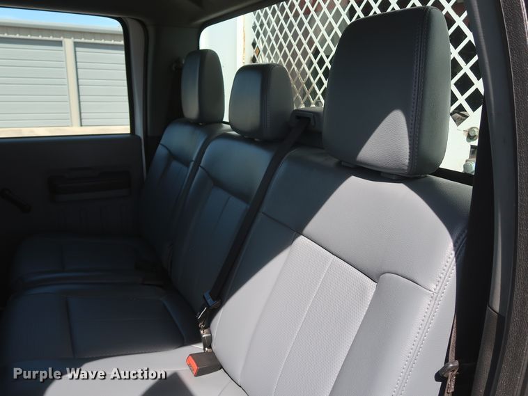 image for item GS9846 2013 Ford F550 Super Duty XL Crew Cab utility bed truck with crane