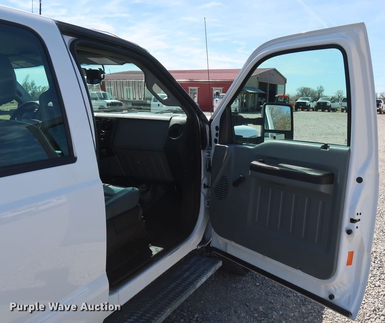 image for item GS9846 2013 Ford F550 Super Duty XL Crew Cab utility bed truck with crane