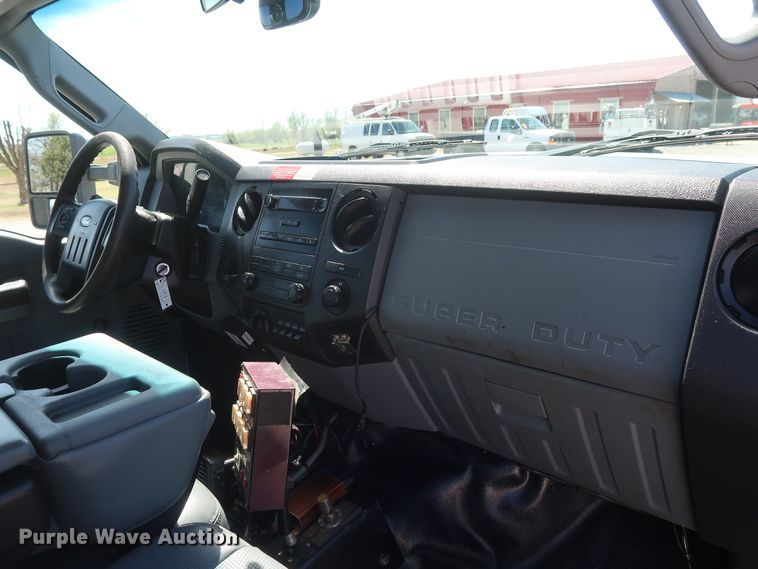 image for item GS9846 2013 Ford F550 Super Duty XL Crew Cab utility bed truck with crane