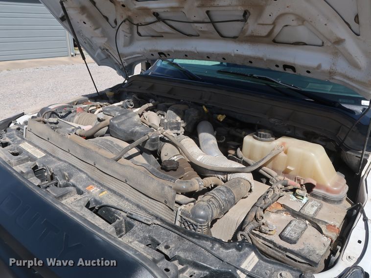 image for item GS9846 2013 Ford F550 Super Duty XL Crew Cab utility bed truck with crane