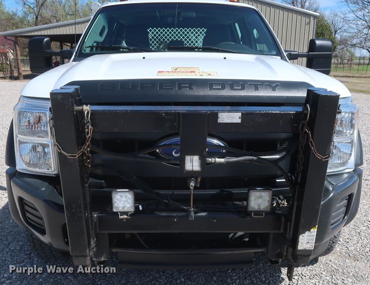 image for item GS9846 2013 Ford F550 Super Duty XL Crew Cab utility bed truck with crane