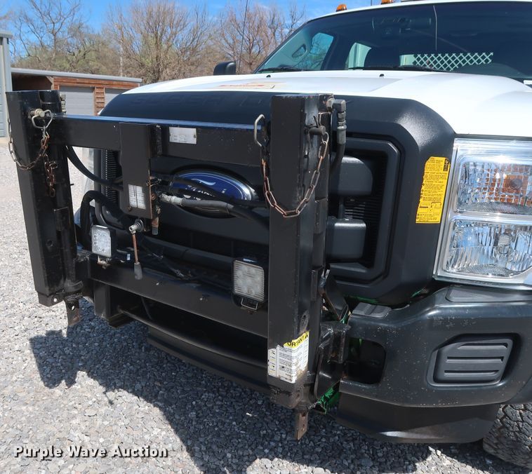 image for item GS9846 2013 Ford F550 Super Duty XL Crew Cab utility bed truck with crane