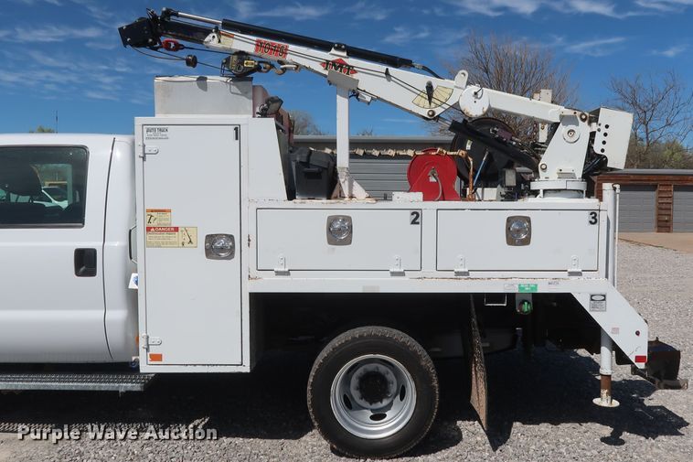 image for item GS9846 2013 Ford F550 Super Duty XL Crew Cab utility bed truck with crane