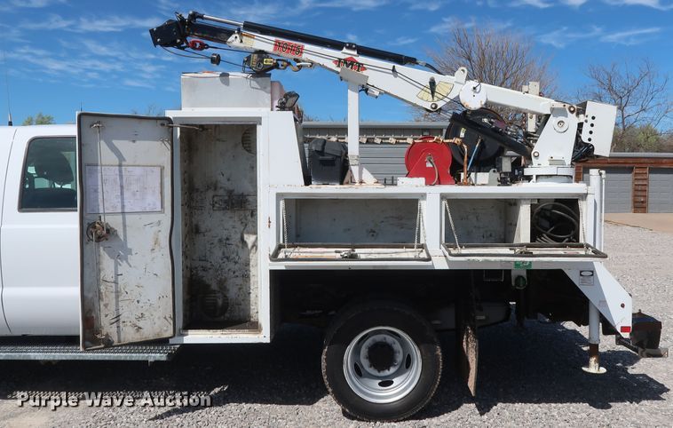 image for item GS9846 2013 Ford F550 Super Duty XL Crew Cab utility bed truck with crane