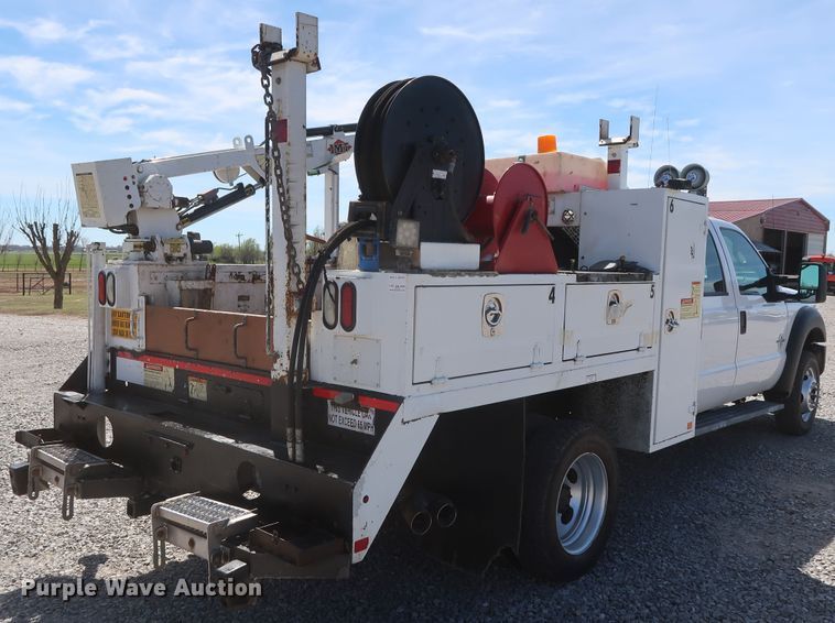 image for item GS9846 2013 Ford F550 Super Duty XL Crew Cab utility bed truck with crane