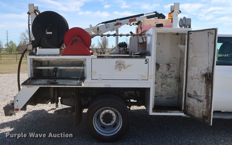 image for item GS9846 2013 Ford F550 Super Duty XL Crew Cab utility bed truck with crane