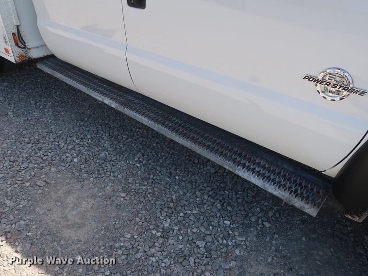 image for item GS9846 2013 Ford F550 Super Duty XL Crew Cab utility bed truck with crane