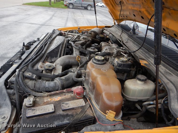 image for item DF3040 2008 Ford F550 Super Duty XL Crew Cab dump flatbed truck