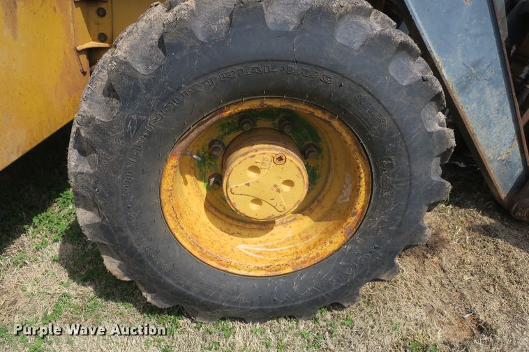 image for item DF5112 2007 John Deere 410J  backhoe