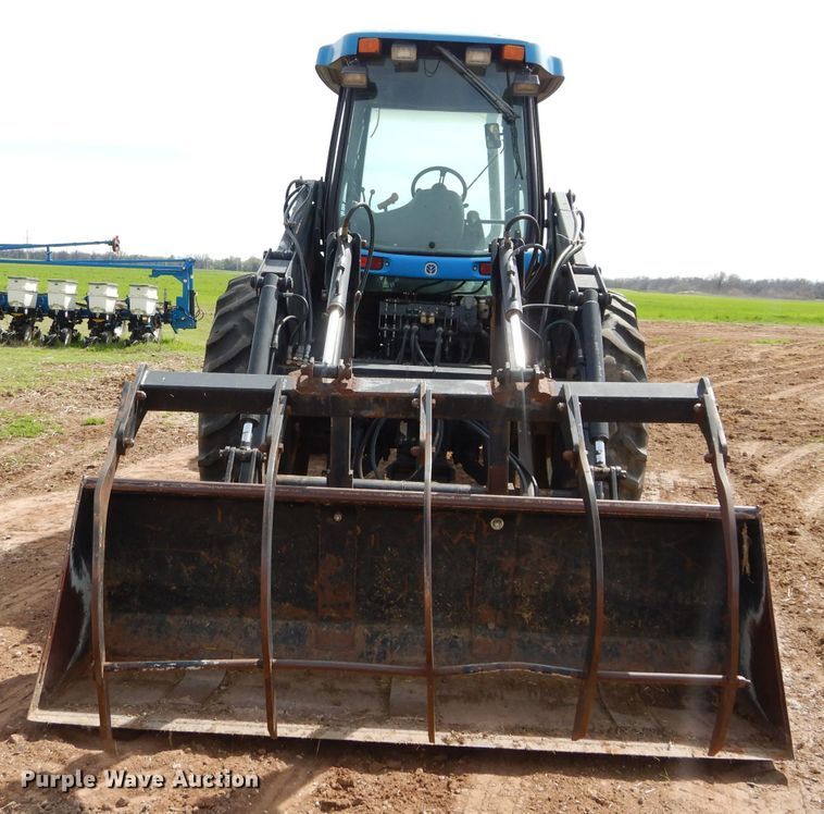 image for item GK9164 New Holland TV140 bi-directional tractor
