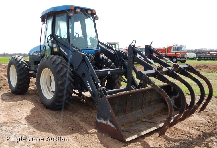 image for item GK9164 New Holland TV140 bi-directional tractor