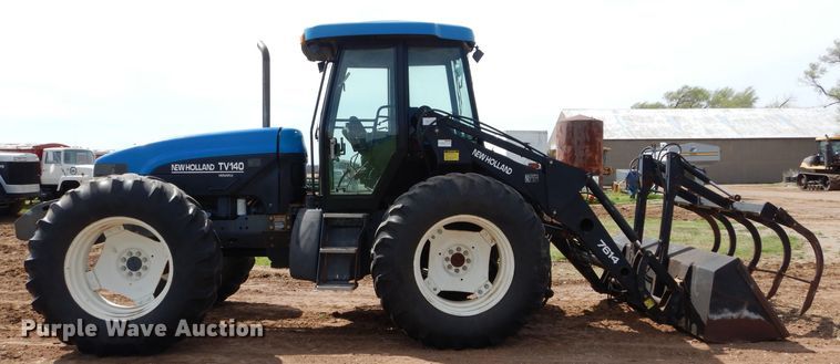 image for item GK9164 New Holland TV140 bi-directional tractor