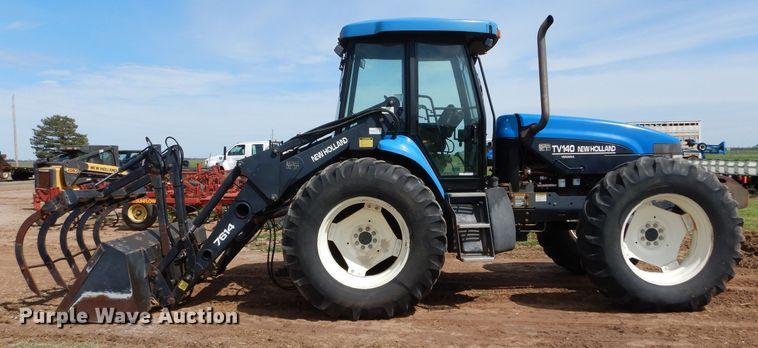 image for item GK9164 New Holland TV140 bi-directional tractor