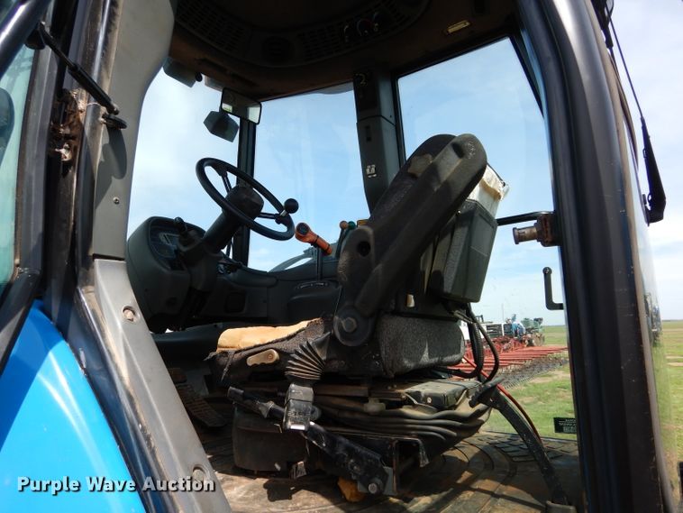 image for item GK9164 New Holland TV140 bi-directional tractor