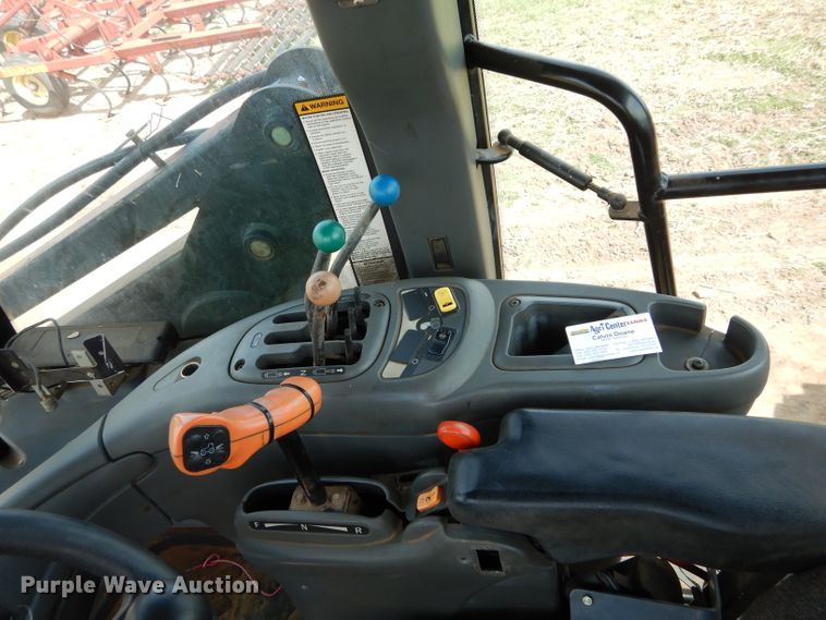 image for item GK9164 New Holland TV140 bi-directional tractor